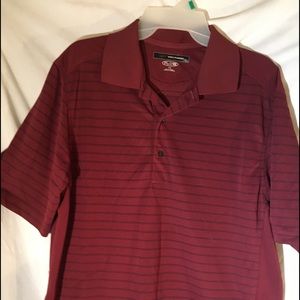 Greg Norman polo shirt shark on back .